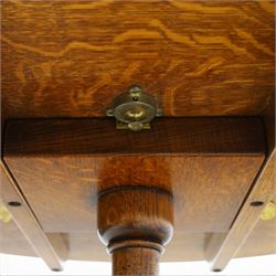 Traditional design golden oak tilt-top tripod table, brass fittings, turned baluster column on splayed supports