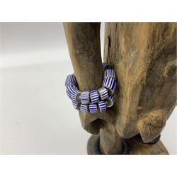 Early 20th century West African Yoruba family wooden figure of Orisha Oko, the god of farming/agriculture, carved from the solid, bears manuscript label of provenance verso H26.5cm