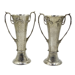  Two Art Nouveau beaten silver vases, floral design twin handles by Charles Edwards, London 1905/06, approx 20oz   