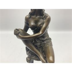 Art Deco style bronze modelled as a female figure seated upon a chair, after Pierre Collinet, H28cm