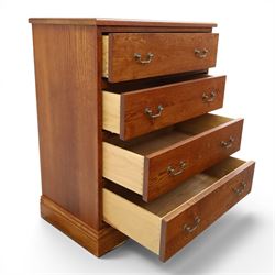 Cabinet-made oak chest, fitted with four soft-close drawers, brass swan neck handles and pierced backplates, on bracket feet