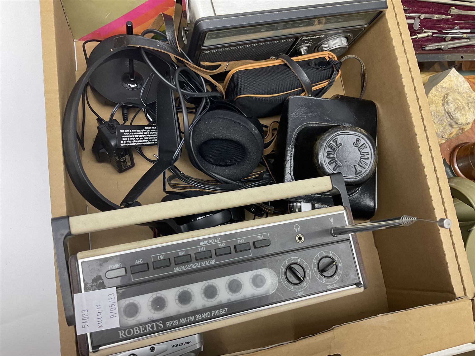 Johnson Bros Indies pattern tea and dinner wares, painted metal female bust on wooden plinth, three radios including one Roberts, Zenit B camera body, Polaroid 1000 land camera, Lorus wristwatch, and other ceramics etc, in four boxes