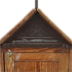 Musgrave & Co Ltd (Belfast) - late 19th century pine saddle horse, with three drawers to one end and cupboard door to the other, the hinged top opening to form a table, the cast iron plaque bears the Royal coat of arms and maker's name