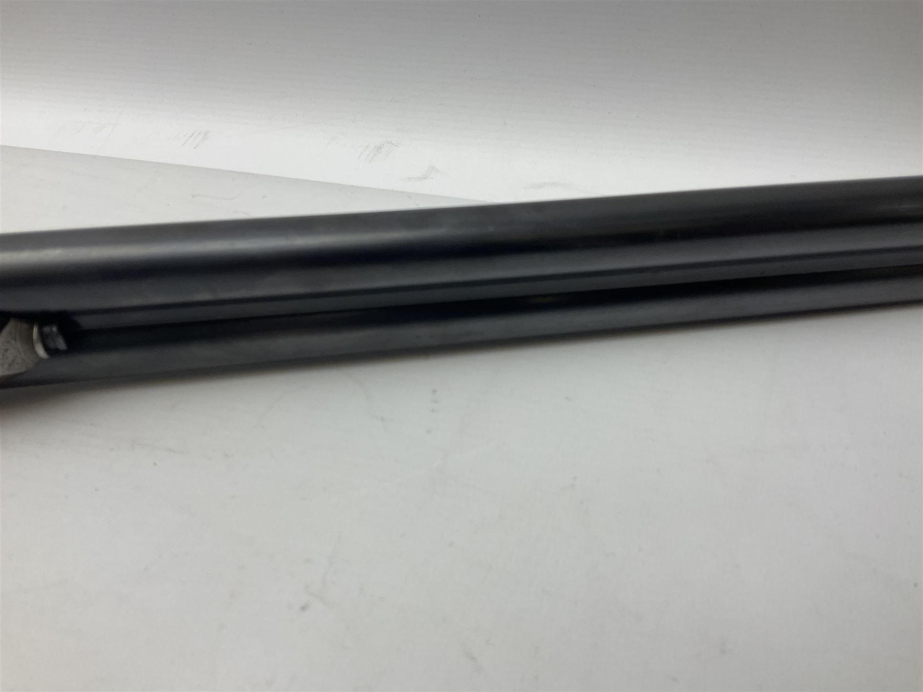 Smith Midgley Bradford 12-bore side-by-side double barrel side-lock ejector shotgun with 71cm barrels, engraved action with patented top lever, ivy leaf fences and top safety, walnut stock with chequered grip and fore-end, serial no.62409 to barrels and 1481 to action, L115cm overall SHOTGUN CERTIFICATE REQUIRED