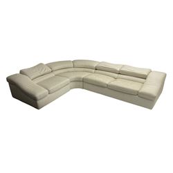 Natuzzi - 'Wave' corner sofa, upholstered in cream leather, in three sections with adjustable back rests 