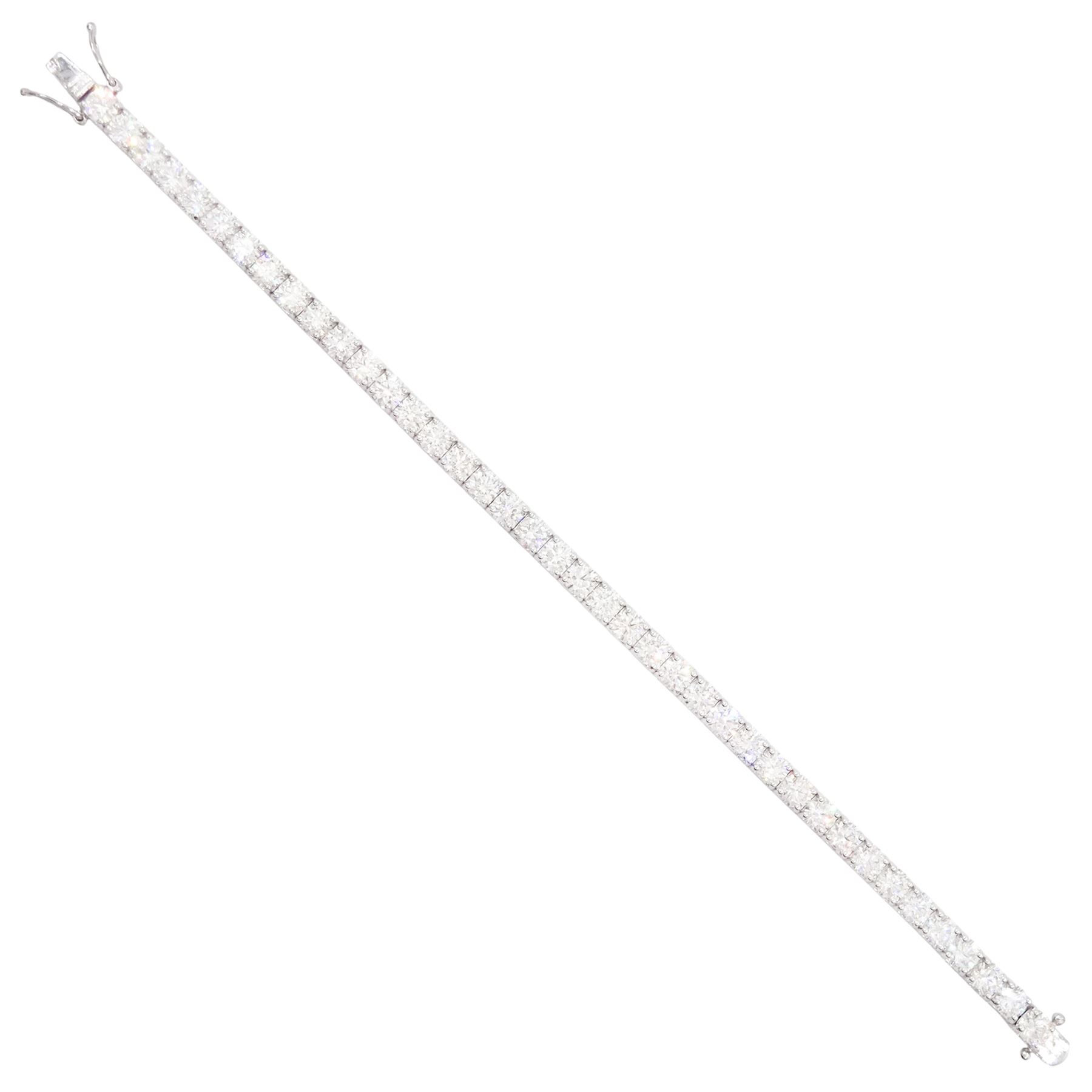 18ct white gold diamond bracelet, forty round brilliant cut diamonds , in a four claw setting, stamped 18K, total diamond weight 12.26 carat, with World Gemological Institute report