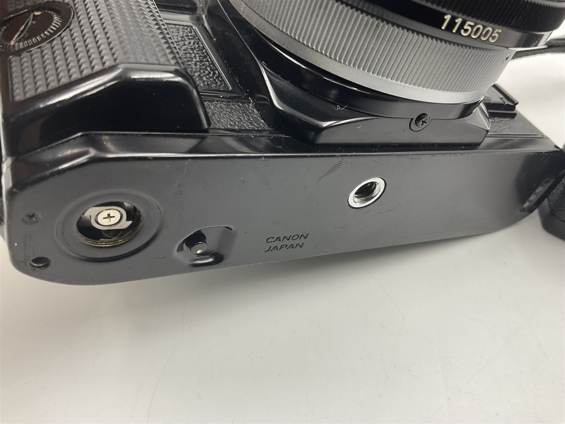 Canon A1 camera body, serial no 884847 with 'Canon FD 55mm 1;1.2 s.s.c' lens serial no 115005