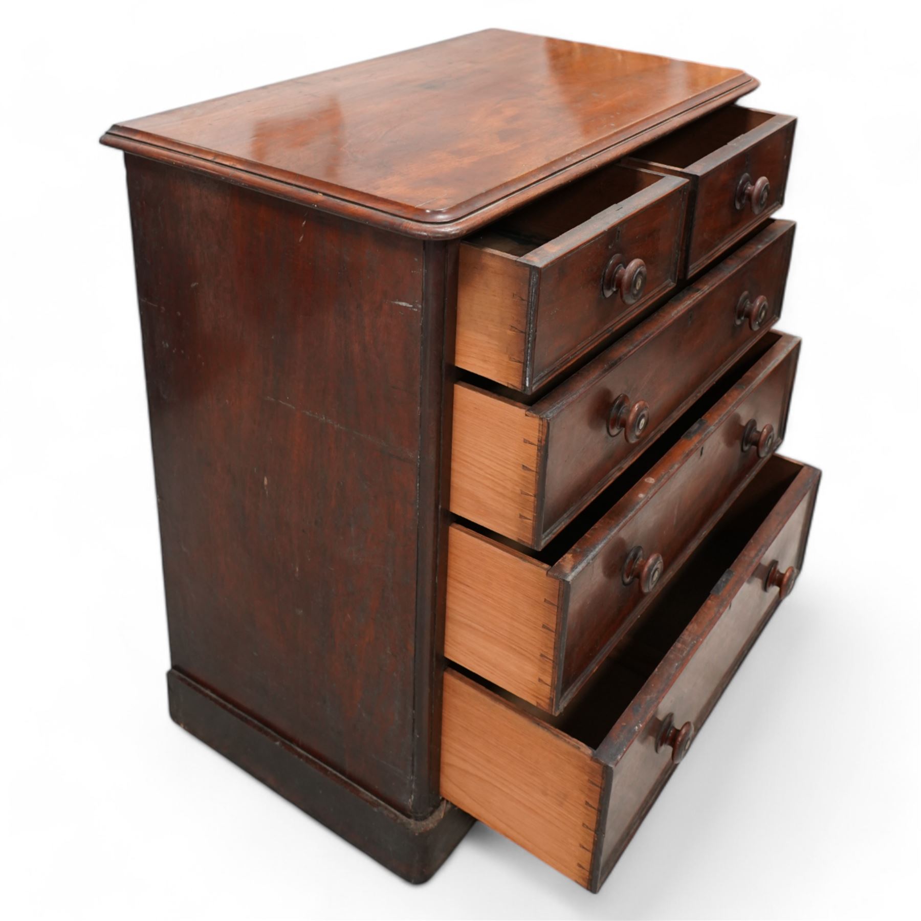 Mid-19th century mahogany chest, fitted with two short and three long drawers, rounded corners, on skirted base