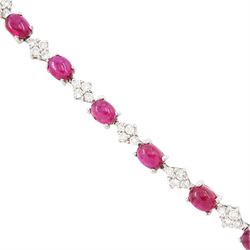 18ct white gold ruby and diamond bracelet, fifteen oval cabochon cut rubies, each spaced by four round brilliant cut diamonds, Sheffield 2009, total ruby weight 10.10 carat, total diamond weight approx 0.60 carat