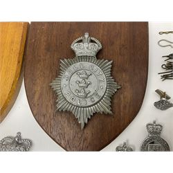 Police - large quantity of cap and collar badges, collar numbers and buttons for Hull City Police, Humberside Police, Lincolnshire Constabulary, York & North East Yorks Police etc; all queen's crown; and three helmet plates including one king's crown