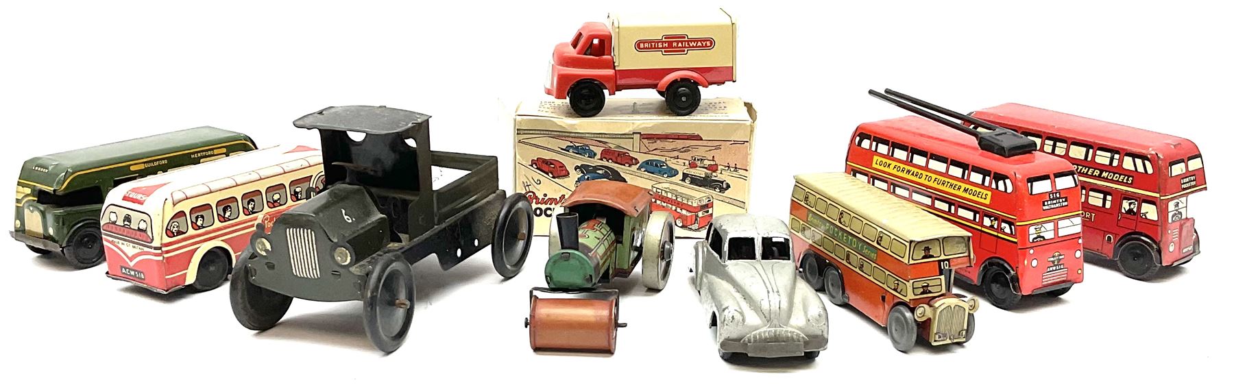 Wells Brimtoy/Pocketoy - eight tin-plate/clockwork or friction-drive vehicles comprising London Trolley Bus, two Double Decker buses, Tour Coach, Greenline Coach, open truck, boxed British railways van and Steam Roller; seven unboxed; and Pocketoy die-cast clockwork saloon car  (9)