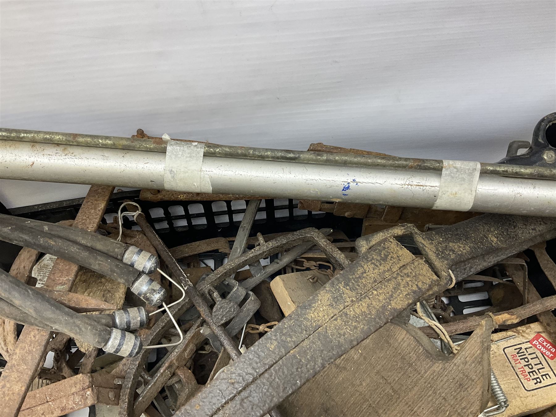 Quantity of animal traps including, gin traps, eel spears, Young's sparrow trap etc, Auctioneer's Note: These traps are sold as artefacts for ornamental purposes only as the use of some of them may be illegal