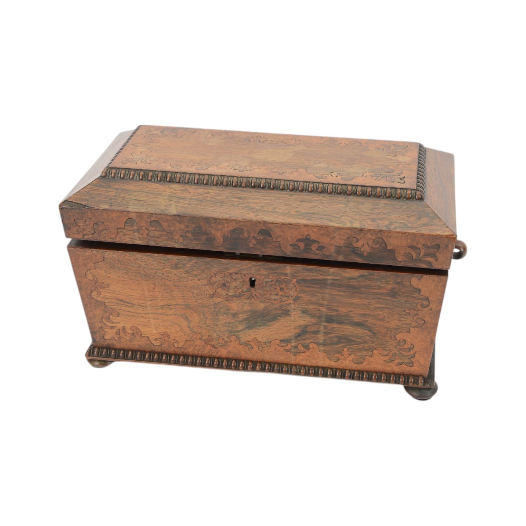 Victorian rosewood inlaid tea caddy, of sarcophagus form with twin ring handles, the interior with two lidded compartments  and later central mixing bowl, upon four bun supports, H32cm