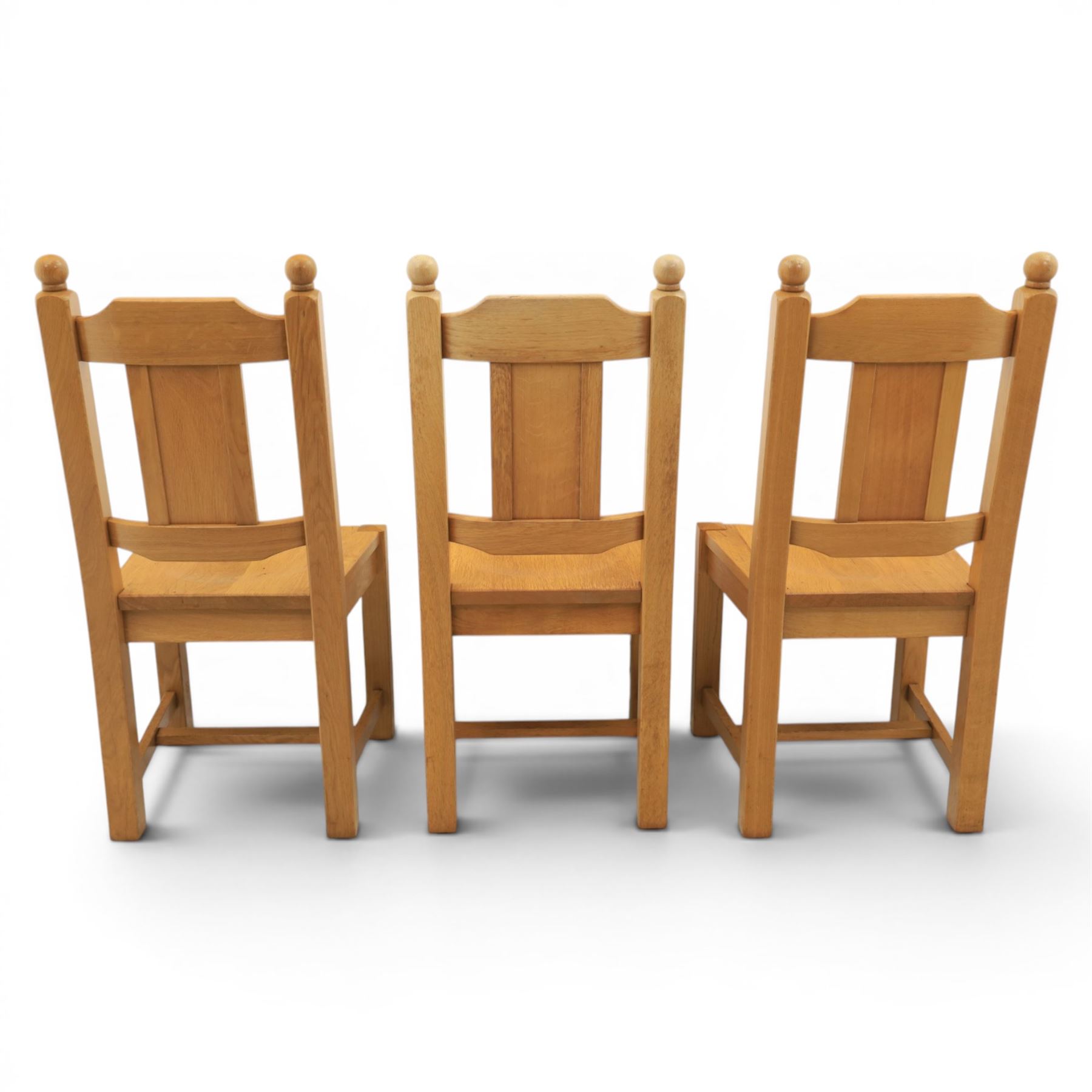 Contemporary solid oak dining table, and set of eight chairs, rectangular plank top with chamfered edges, raised on square supports