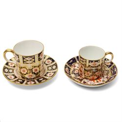 Royal Crown Derby pattern 2451 items, comprising smaller and larger coffee cans with saucers, crescent pin tray and plate (D23cm), together with a boxed Yorkshire Rose pattern plate, and a 1999 'Rabbit' year tray