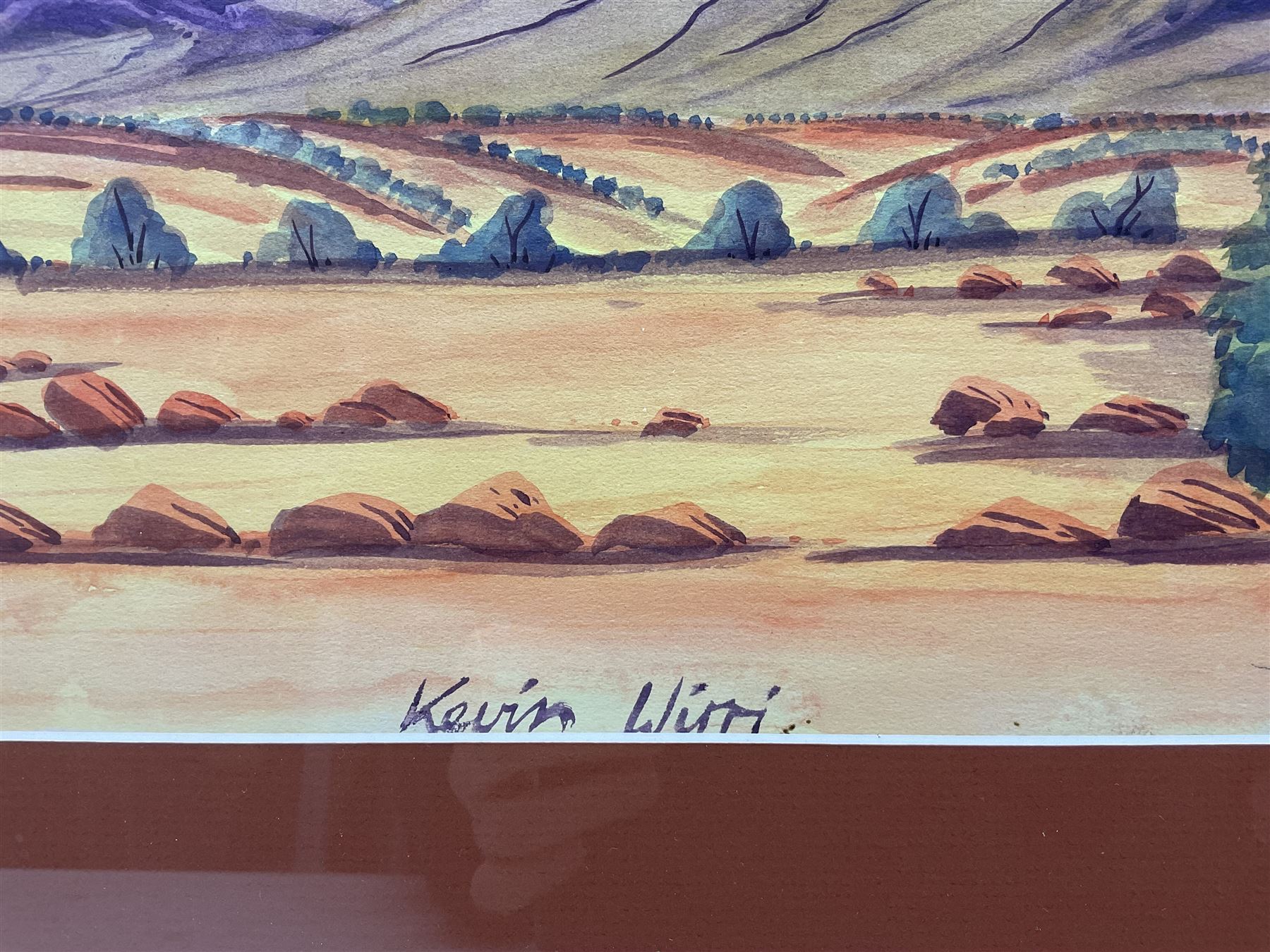 Kevin Wirri (Aboriginal Australian 1953-): Outback Landscape, watercolour signed 36cm x 48cm 