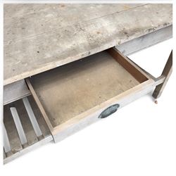 Large 19th century painted pitch pine scullery table, rectangular triple plank top fitted with single drawer, raised on square supports united by slatted under-tier