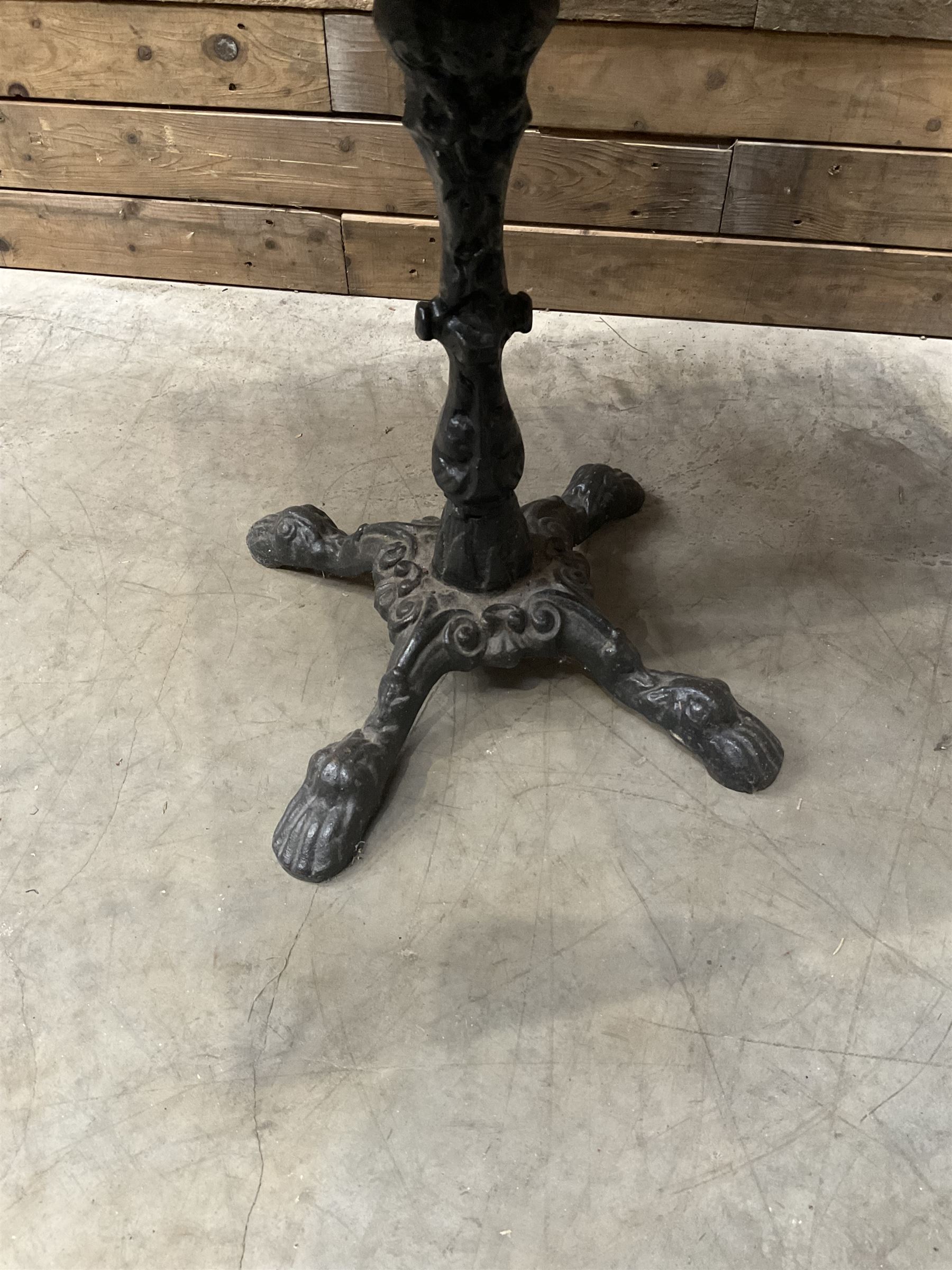Cast iron Britannia circular pub table, and two pedestal cast iron bases (3)