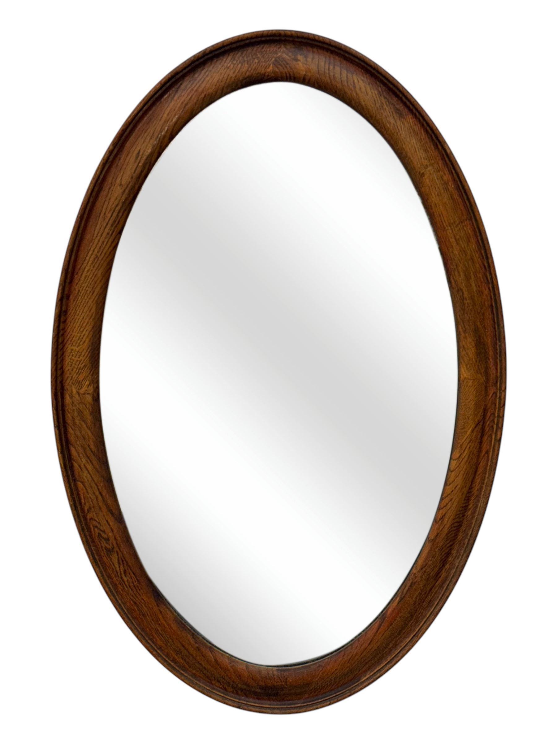 Late 19th century black-painted cane seat chair; early 20th century radial spindle-back chair with green upholstery; early 20th century mahogany single-drawer side table; mid-20th century carved wooden stool with harp motif; early 20th century hexagonal bamboo stand; two oval mirrors (7)