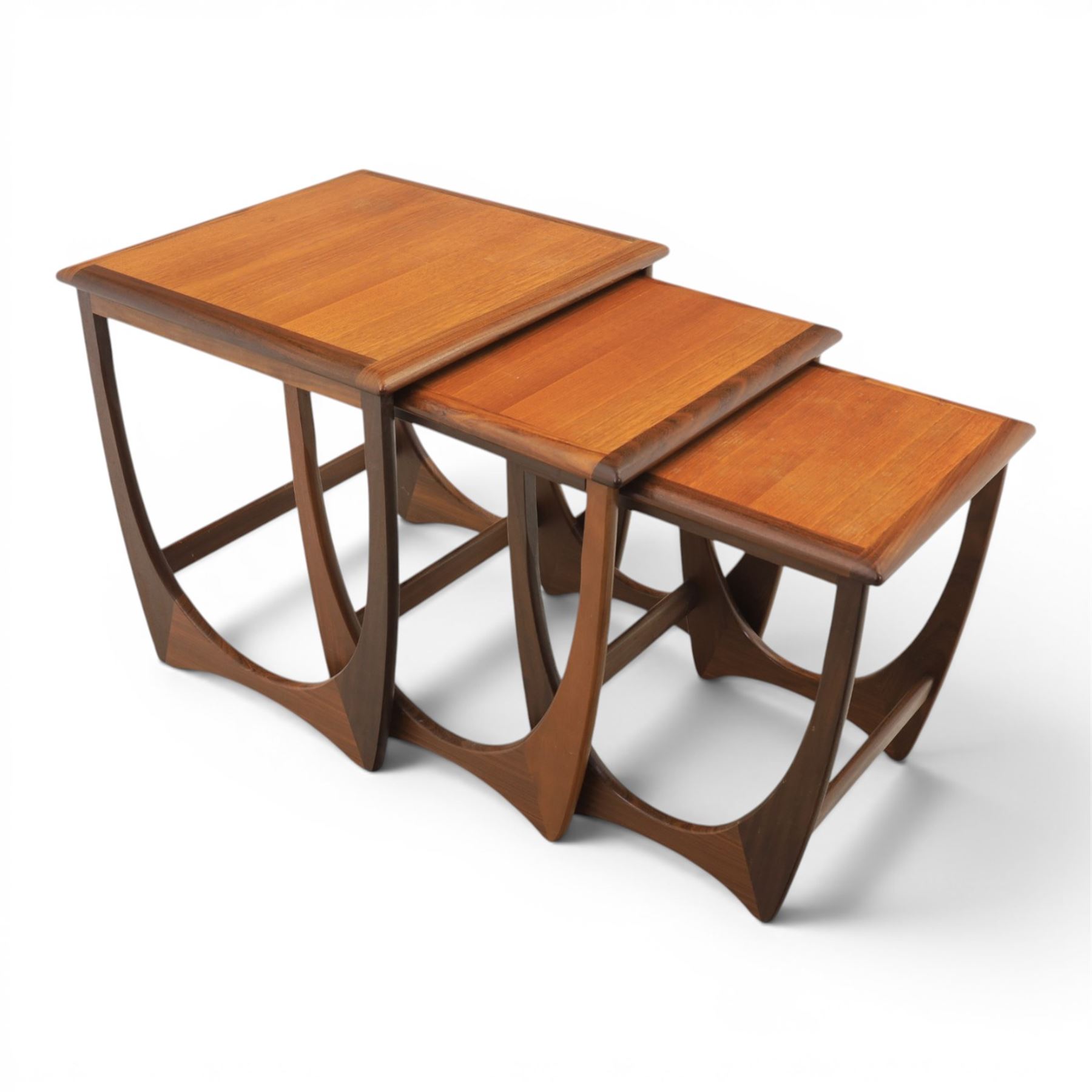 G-Plan - 'Astro' teak nest of three tables, square top with shaped supports