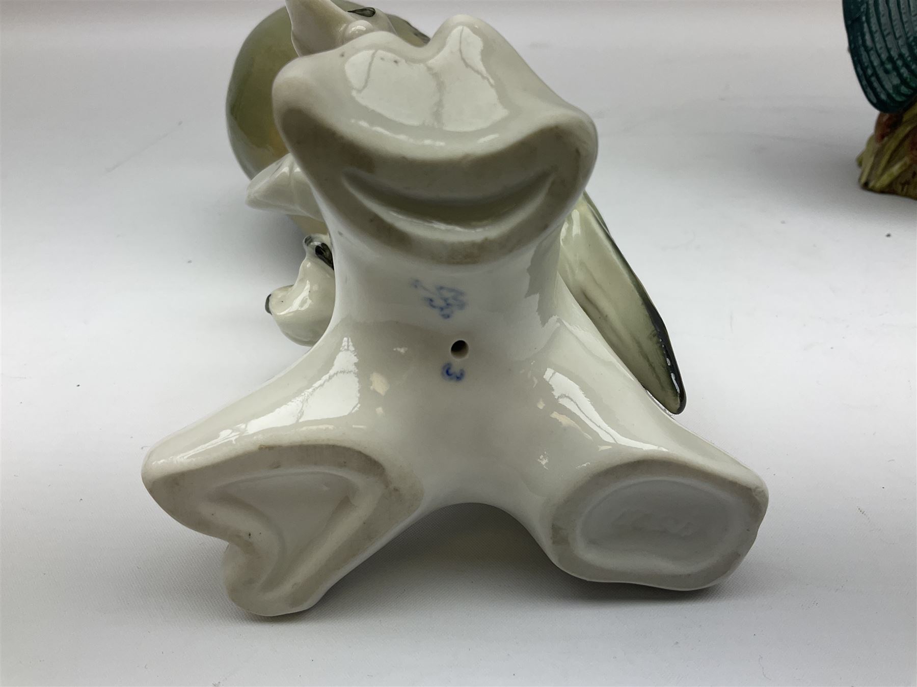 Karl Ens figure of a green woodpecker, modelled perched upon branch, model no. 7527, together with Karl Ens figure of budgie and Beswick Kingfisher no. 2371, all with printed marks beneath, tallest H25cm