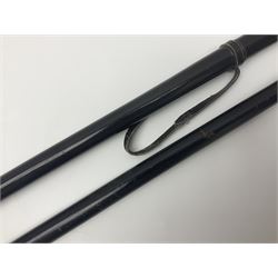 Two ebonised walking sticks, one with 'Leeds City Police' embossed top, tallest H92cm