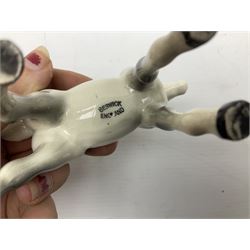 Seven Beswick figures of horses, including Connemara pony in grey no.1641, Arab in bay no.1265, large foal in grey no.947 etc, together with a Goebel figure of a horse (8)