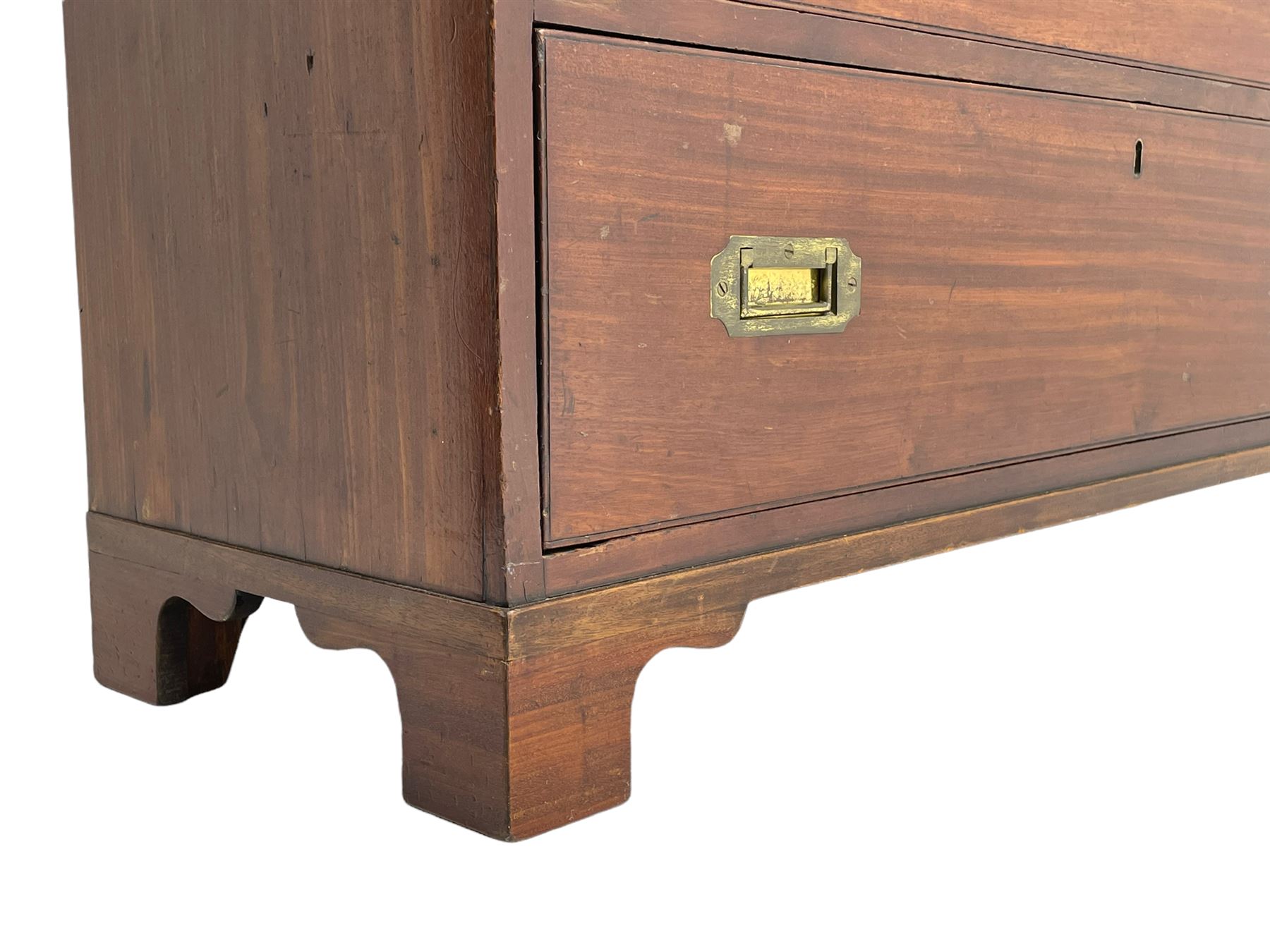 Georgian military type campaign chest, narrow rectangular top over three short and three long drawers, recessed brass handles, on bracket feet