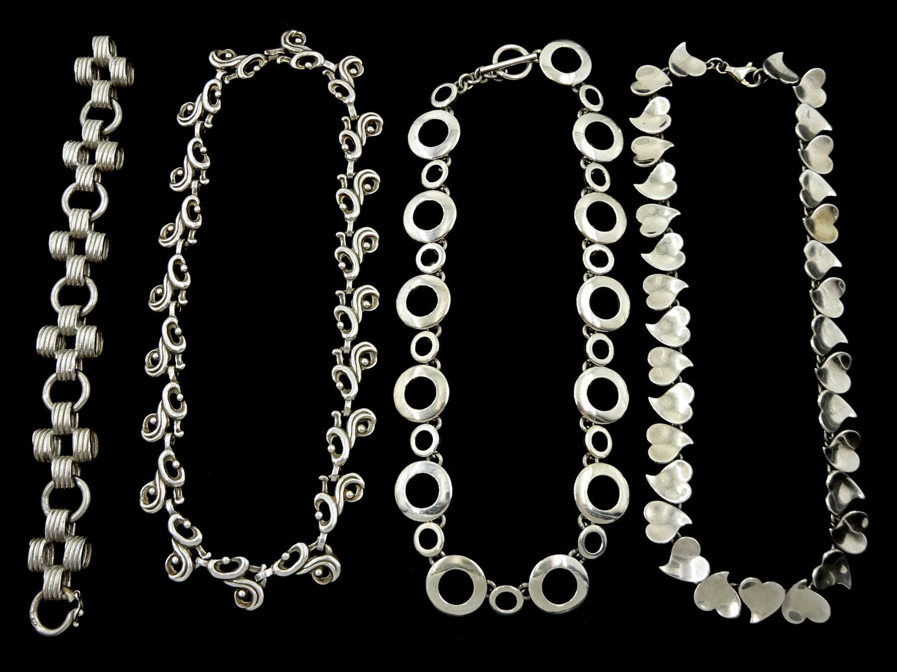 Two silver heart link and circular link necklaces by Tianguis Jackson, Edinburgh, silver bracelet by A G C and one other silver necklace