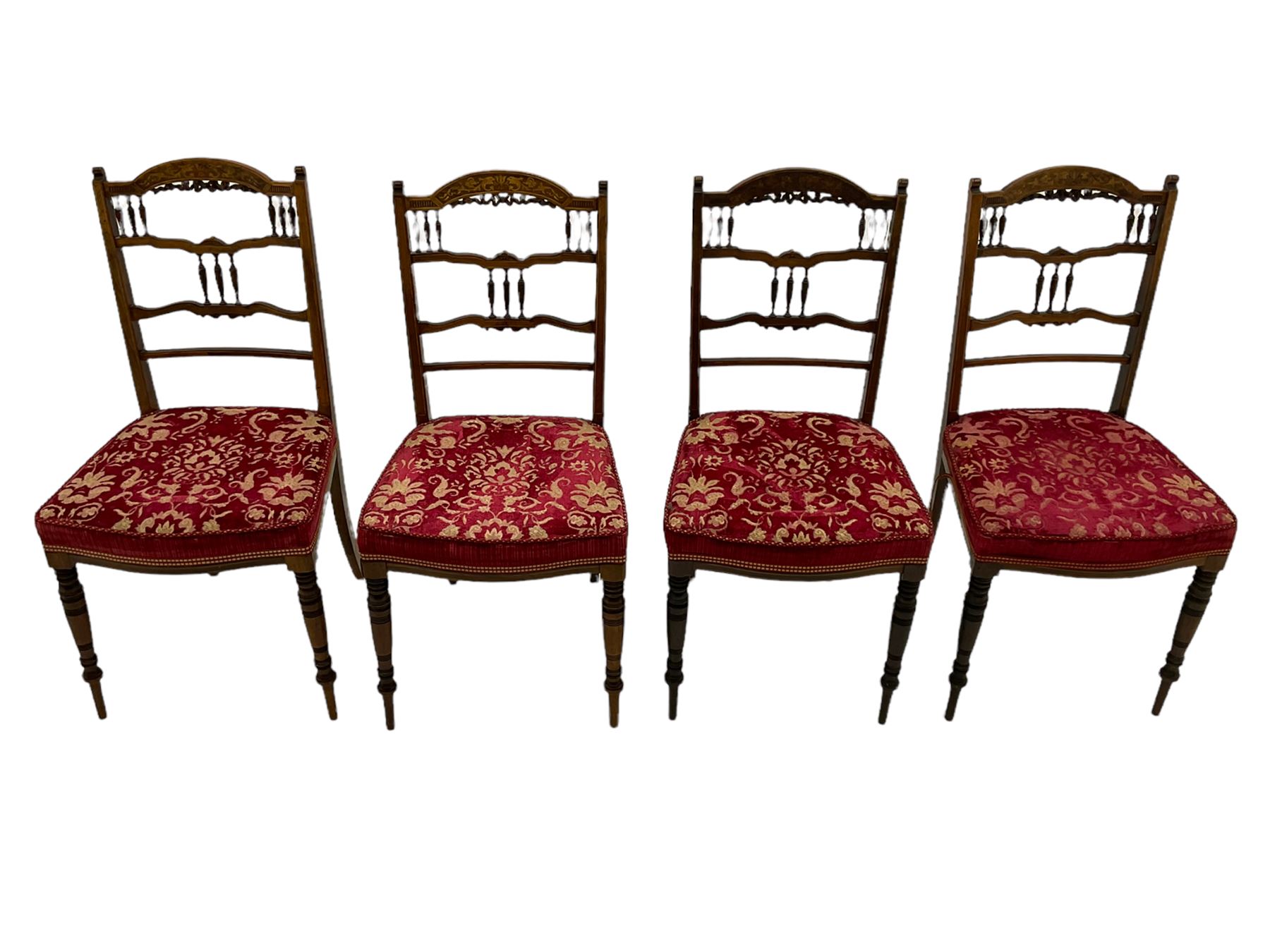 Edwardian inlaid rosewood salon suite, upholstered in red and gold fabric, comprising two seat sofa, pair of tub shaped armchairs, and four side chairs