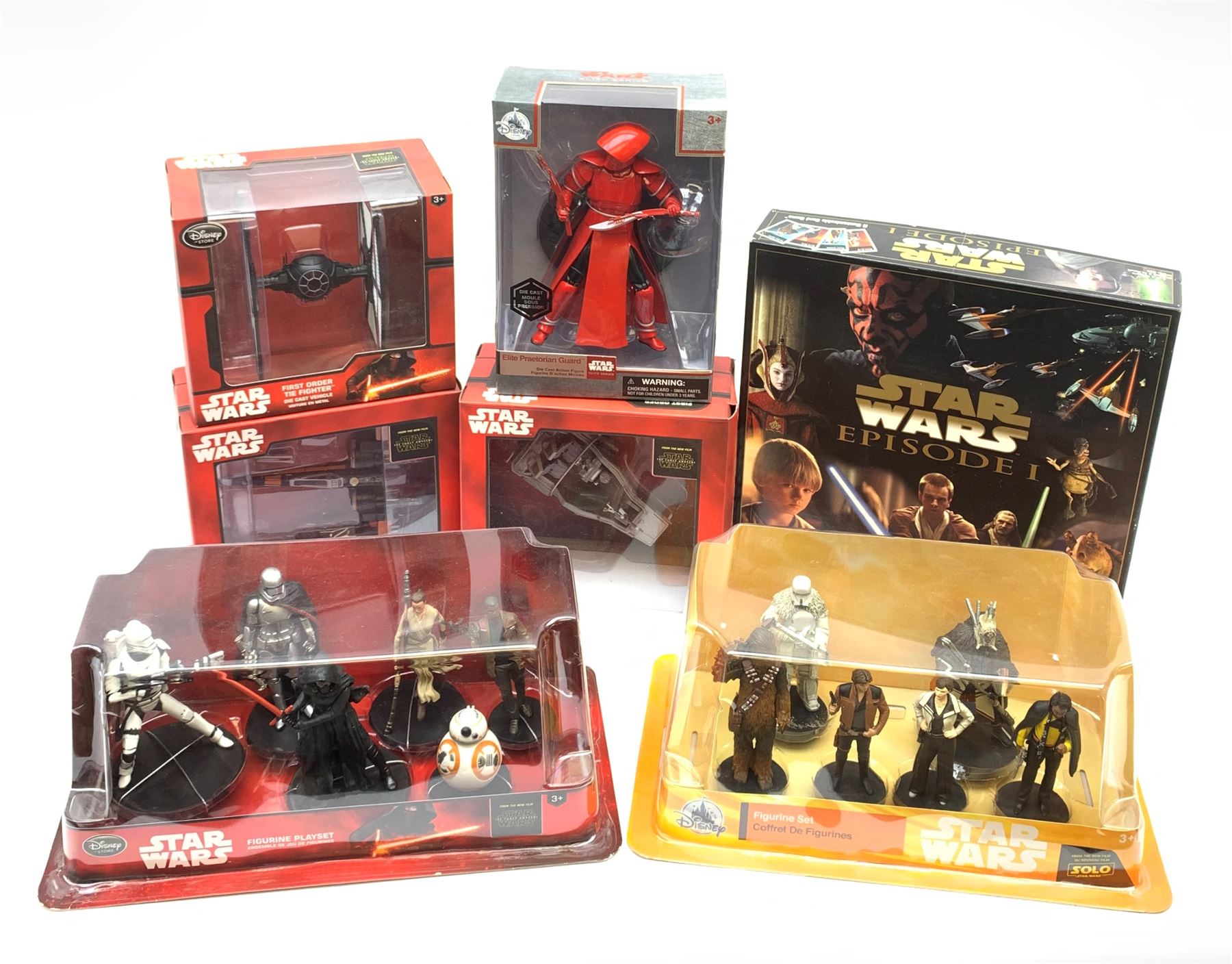 Star Wars - Disney Store The Force Awakens figurine playset, Poe's X-Wing Fighter, Snowspeeder and First Order Tie Fighter; Solo figurine set; The Last Jedi Elite Series die-cast action figure of Praetorian Guard; all mint and boxed; together with Star Wars Episode 1 card game, boxed (7)