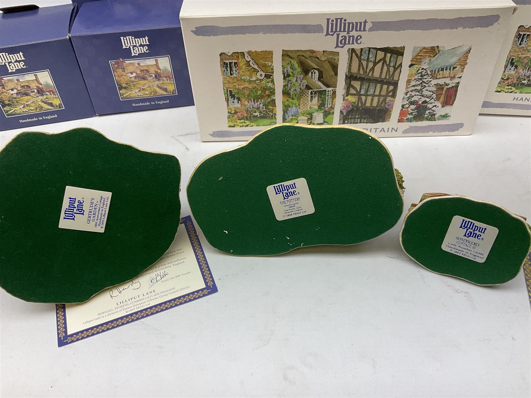Eight Lilliput Lane models, including Gertrude's garden, Cruck End, Honeysuckle cottage, The Pottery, Huddersfield Railway Station, The Magpie Cafe, Amberly Rose, Summer Days and Shades of Summer, all boxed with deeds