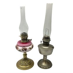 Victorian oil lamp, with pink opaque glass reservoir on a brass columb, together with another oil lamp, tallest example H59cm