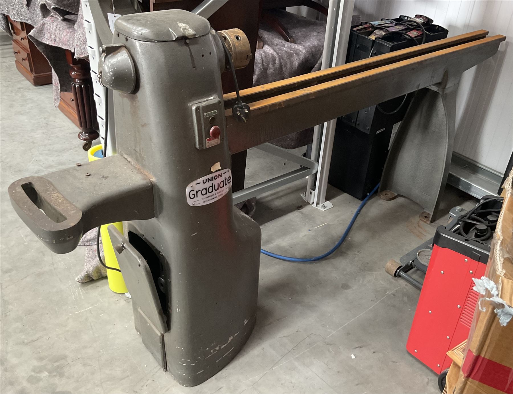 Union Graduate wood turning lathe, four spindle speeds, with various accessories and attachments, full width - 216cm, full bed width - 165cm, working bed width approx - 140cm