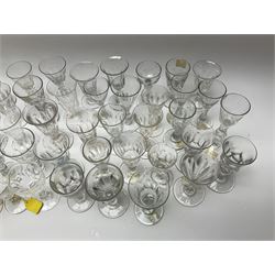 A large group of Victorian and later Victorian style drinking glasses, with part slice cut bowls. 