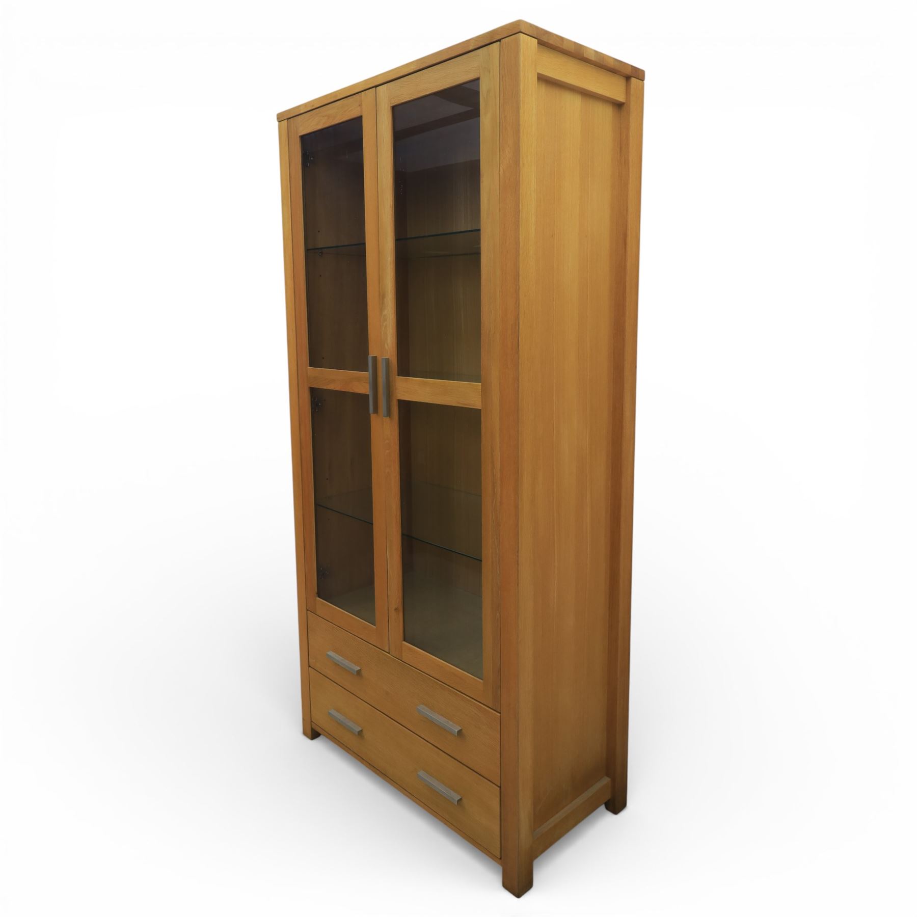 Solid light oak bookcase display cabinet, fitted with two glazed cupboards and two drawers