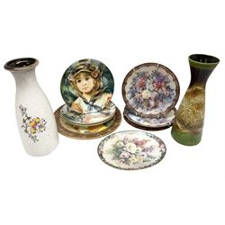 Two German vases to include a West German example, set of four Royal Doulton Francisco Masseria collectors plates, Sylvac Cavalier charger, and set of four Lena Liu plates
