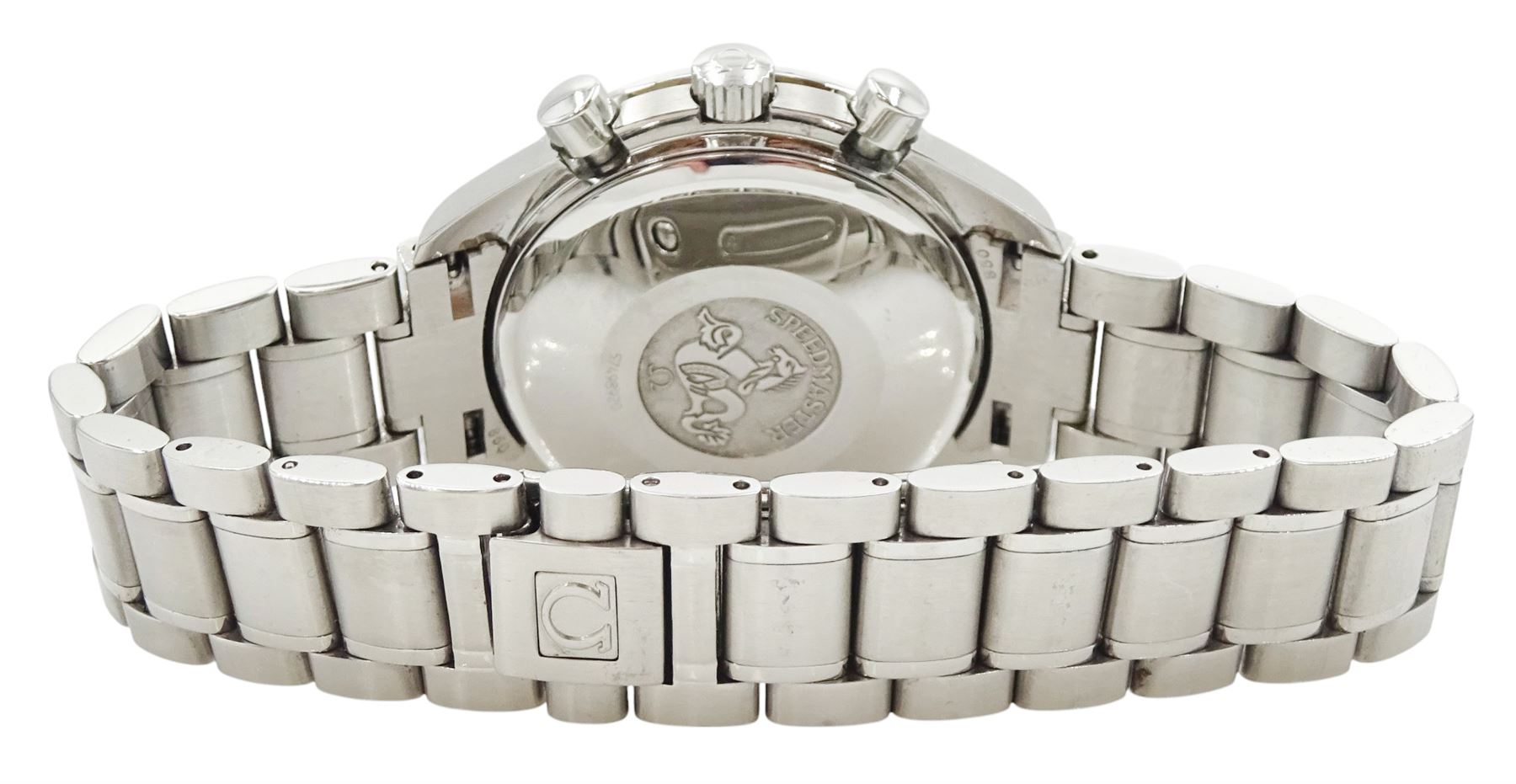 Omega Speedmaster gentleman's stainless steel automatic chronograph wristwatch, back case No. 175.0083, serial No. 57498920, silvered dial with date aperture and subsidiary dials for constant seconds, 30 minute and 12 hour register, stainless steel tachymetre scale bezel, on Omega stainless steel bracelet, with fold-over clasp, with warranty card