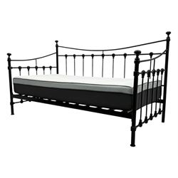 Contemporary Victorian revival black metal day bed, featuring arched back and sides with turned finials and spindle rails, complete with single 'OTTO' mattress