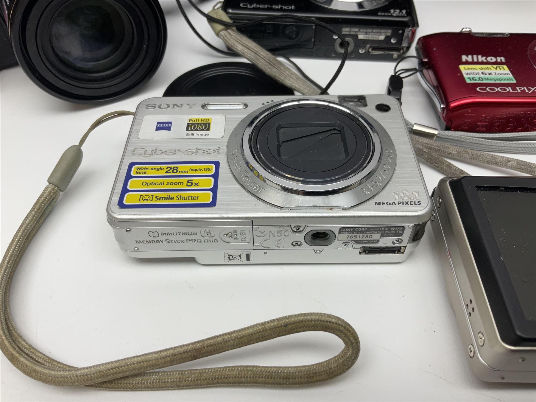 Nikon Coolpix 8700 camera body, serial no 3220838, with Zoom Nikkor Ed 8.9-71.2mm 1:2.8-4.2 lens, together with Canon digital video camcorder and other digital cameras and camera equipment