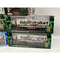 Eddie Stobart - three Oxford Die-Cast Super Rugby League lorries in perspex display cases including the two Hull Clubs; two Lledo Vanguard vans; two Days Gone vans; and Saico Truck & Trailer; all boxed; together with fourteen unboxed Corgi and other tractor/cab units etc (23)