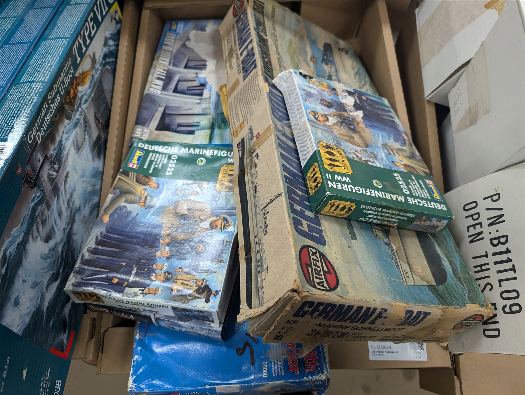 Collection of Revell military model building kits, including three USS Constitution examples, S-100 & Flak, German Submarine U99 and other similar model kits