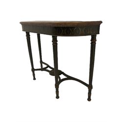 Regency style green finish console table, D-shaped with moulded top, the frieze with repeating foliate pattern, turned and fluted supports joined by a series of shaped stretchers with applied metal bead work and central rose mount