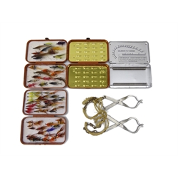  Two House of Hardy brown plastic fly boxes with foam inserts, another with metal clips, a pair of Hardy Bros. boot alloy hangers, and a Wheatley - Kilroy patent fly box with Salmon fly gauge (6)  