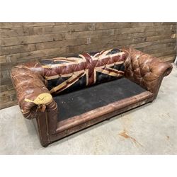 Chesterfield two sofa upholstered in brown leather, with Union Jack pattern, no seat cushions - located in storage, viewing not available