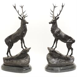 After Jules Moigniez (French 1835-1894): Pair of bronze stag figures on marble bases, each...