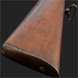 Snider-Enfield service rifle .577 calibre, barrel 33 in., tangent/ladder back sight, action marked with crowned V.R BSA & Co 1872, full stocked with two barrel bands, steel clearing rod, walnut stock marked Mx1 93 Birmingham, overall L124cm