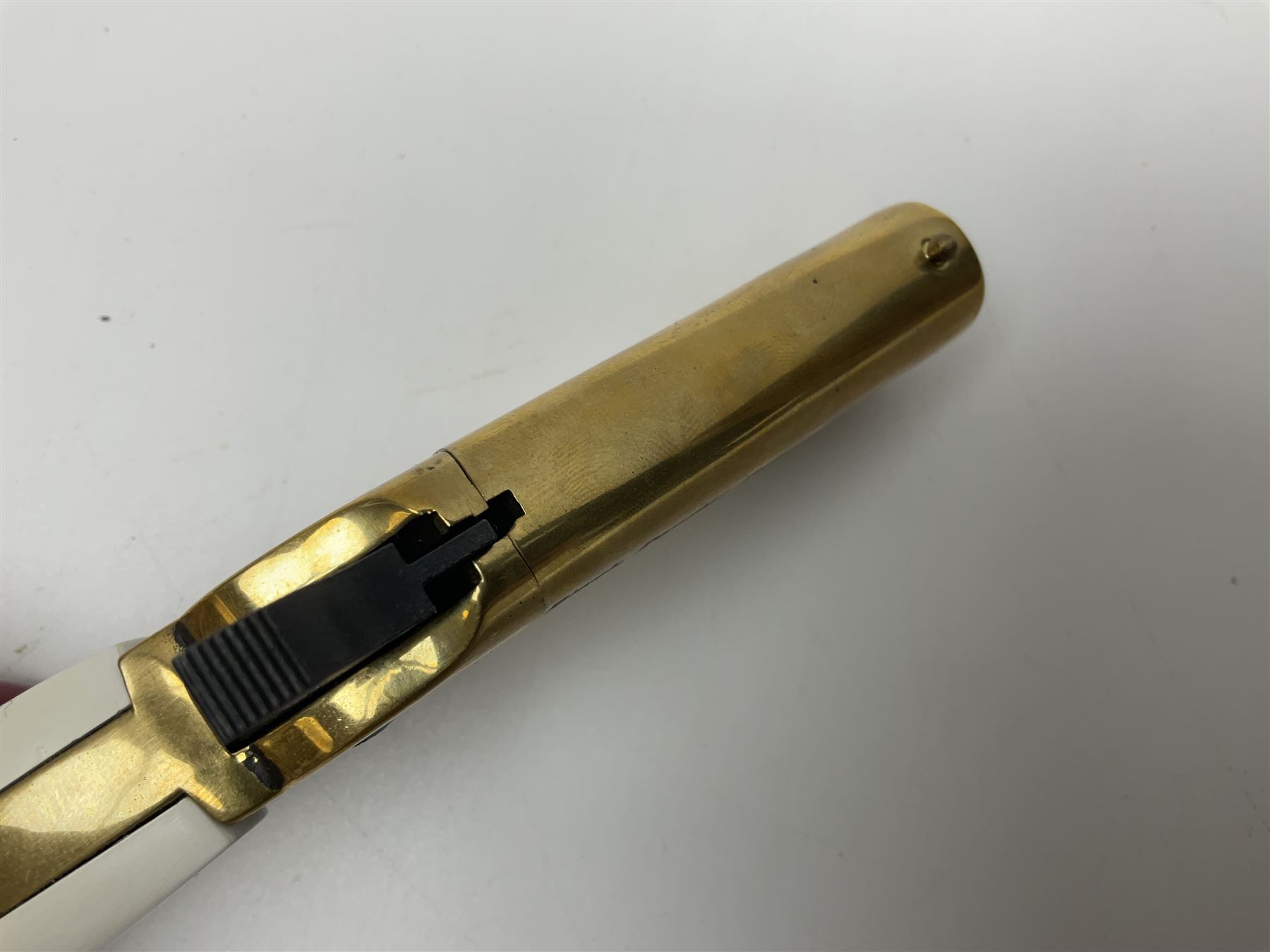 SECTION 1 FIRE-ARMS CERTIFICATE REQUIRED - Spanish Ardesa percussion vest pocket Derringer pistol, .31 cal. black powder; single shot; 6cm barrel; all brass body with white grips; no.14-13-013682-10 with Spanish certificate dated 2010 and box of one hundred balls