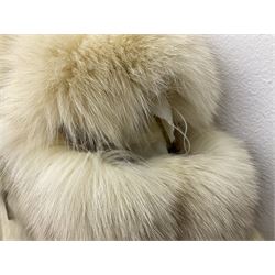 White Arctic Fox fur coat with loop fasteners 