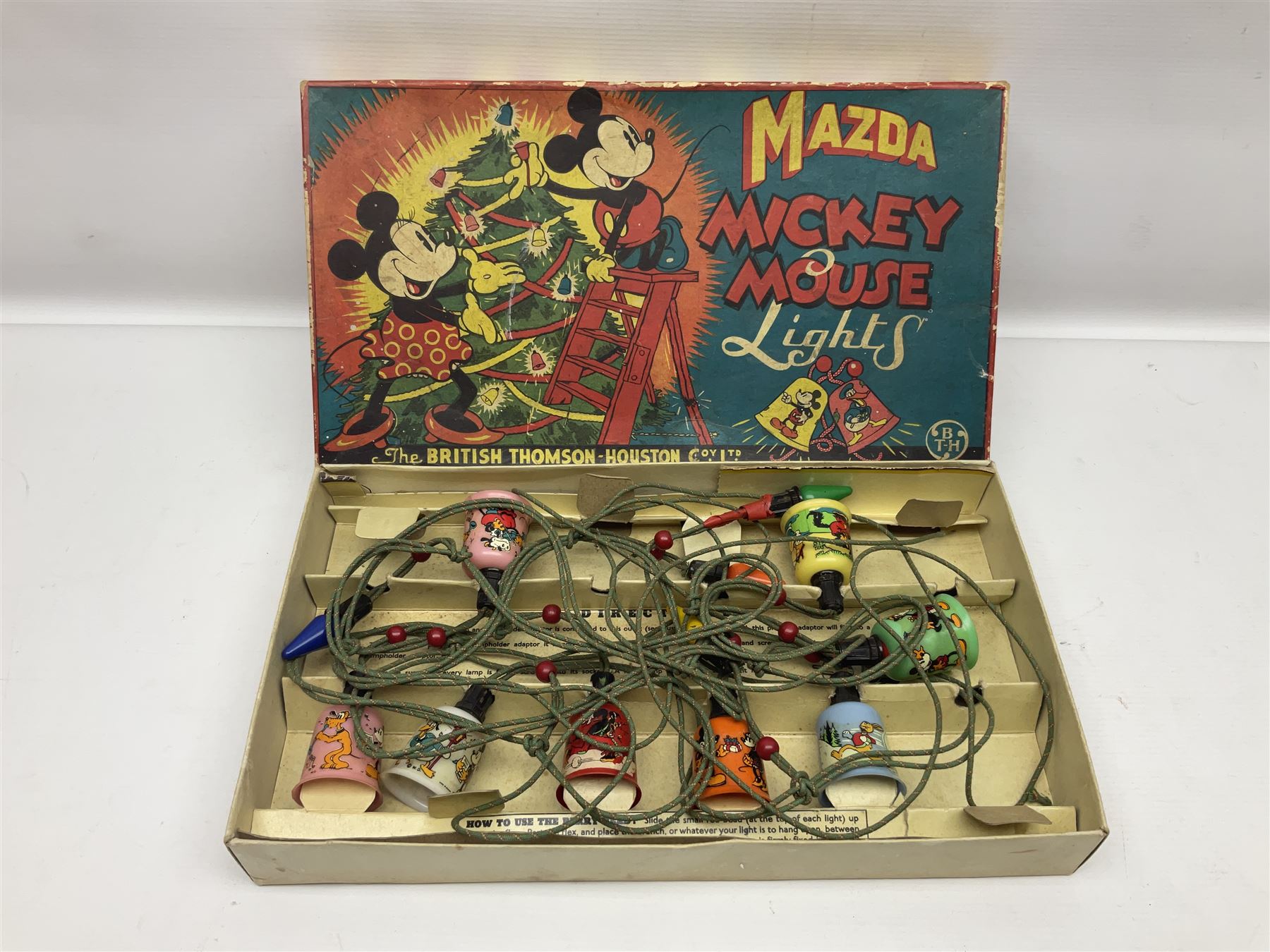 Mazda Mickey Mouse Lights by The British Thomson-Houston Co. Ltd.; boxed; unopened Top Gear Race The Stig game; Dr. Who Talking Cyberman; and Dr. Who Talking Dalek; both boxed (4)